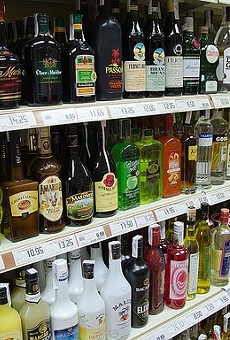 It's now up to Gov. Rick Scott if liquor will be sold in Florida grocery stores