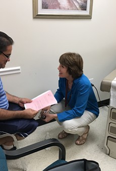Gwen Graham takes a stand for uninsured at Longwood charitable clinic 'workday'