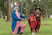 Uncle Sam (James Erwin) greets Lihn and Tommy Volmer, ready for Oct. 24. - Uploaded by JoyinFlorida