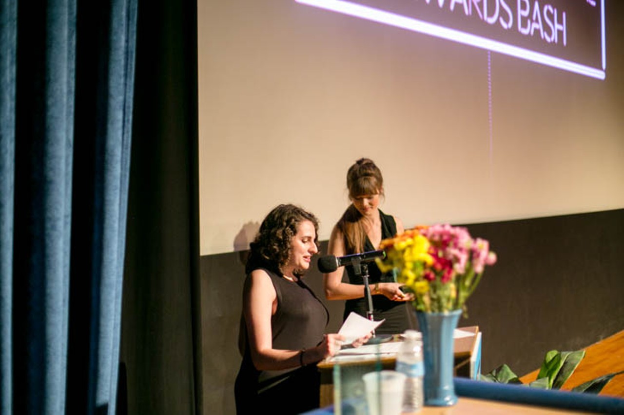 Shea Suzer (left) hosts the awards ceremony